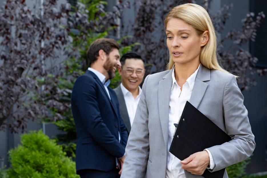 Male employee's laughing at female coworker - Sexual Discrimination